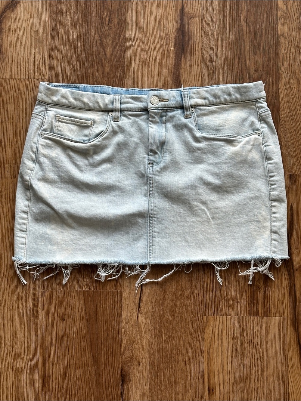 Blank NYC Faded Blue Denim Mini Skirt with Distressed Hem